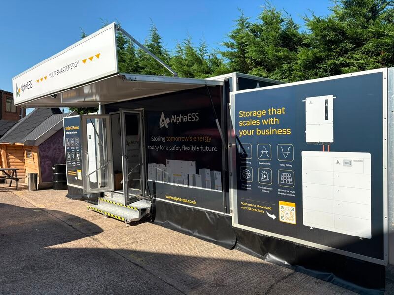 BESSIE opened up to show AlphaESS commercial battery storage displays