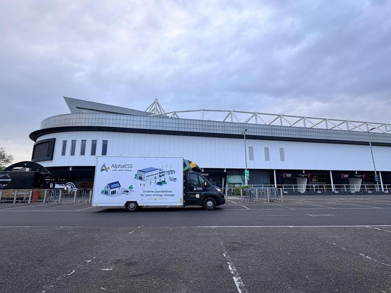BESSIE parked outside a stadium during an AlphaESS UK visit