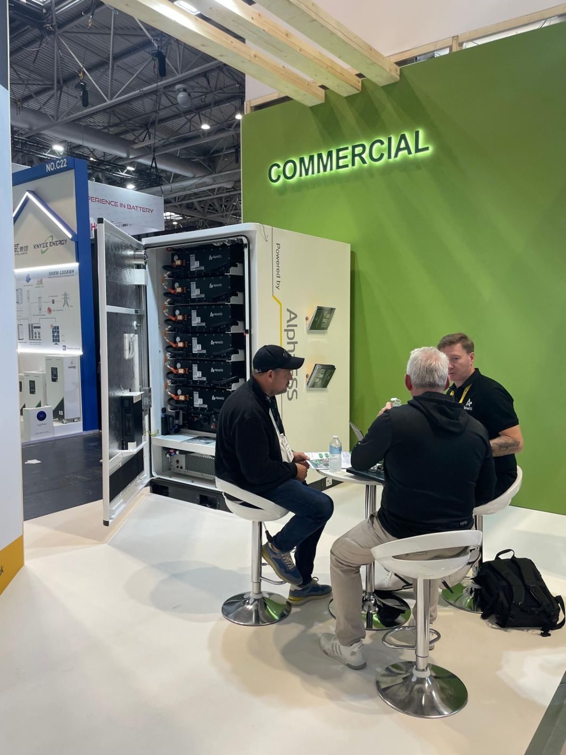 AlphaESS UK team in conversation with visitors on the commercial stand at Solar & Storage Live 2026