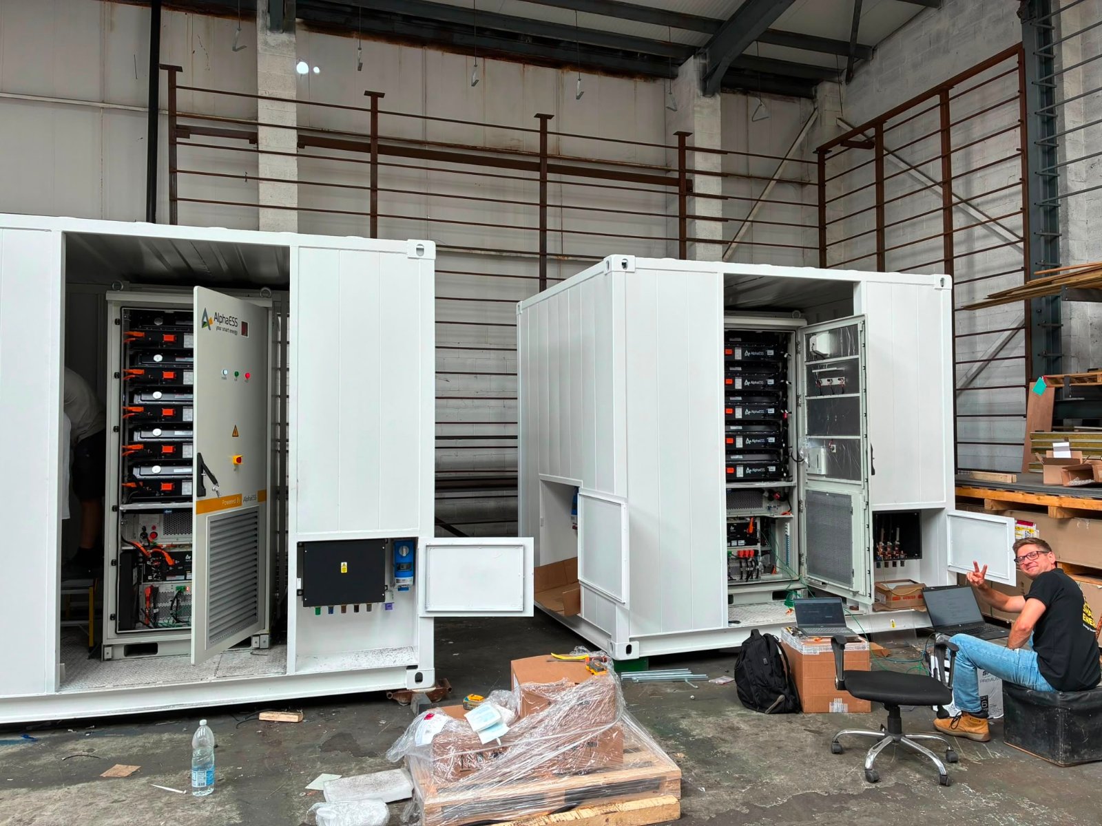 Engineer commissioning AlphaESS TB125 battery enclosures for Quest Power